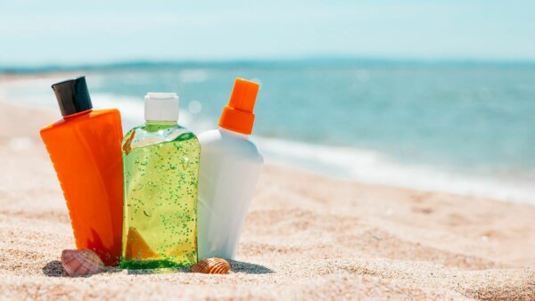 Bottles of sun protection lotion, aloe soothing gel from sun burn, 