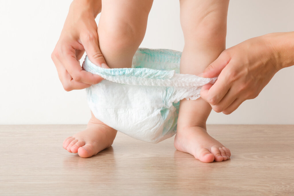 Young,Mother,Hands,Wearing,White,Baby,Diaper,Pants.,Little,Kid