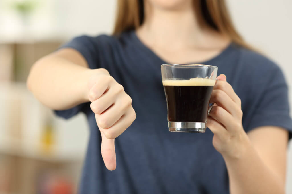 woman holding a cup of coffee