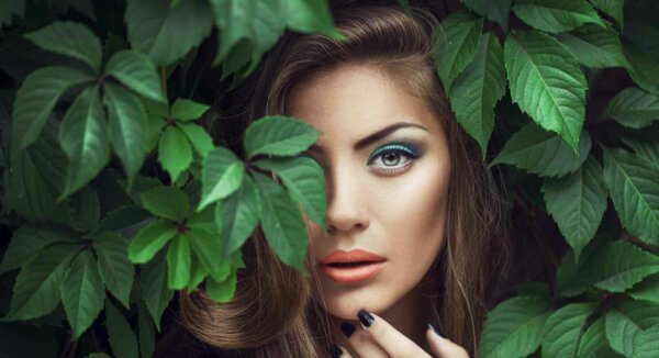 woman with green eyes and make-up