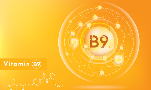 vitamin b9 in orange background