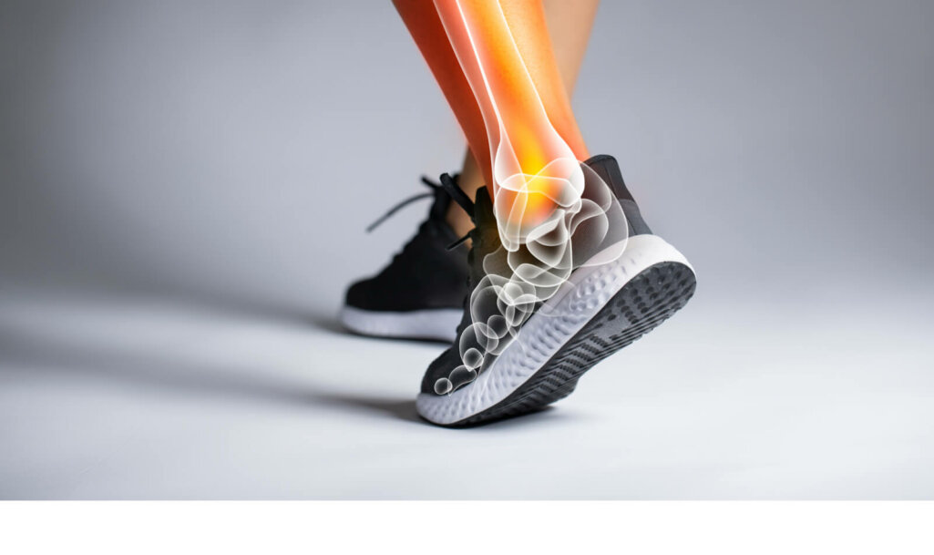 Ankle pain in detail - Sports injuries concept - Orthopedic shoes