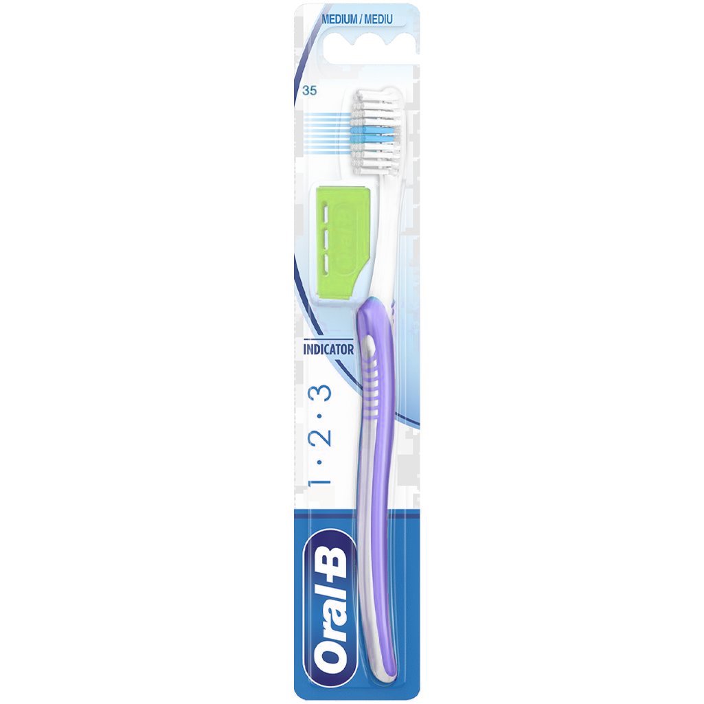 Oral-B 123 Indicator Medium Toothbrush 35mm Χειροκίνητη Οδοντόβουρτσα με Μέτριες Ίνες 1 Τεμάχιο – Λιλά / Πράσινο