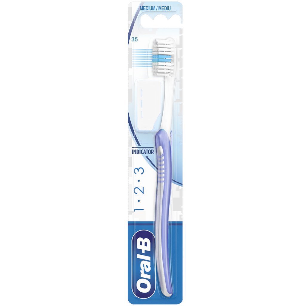 Oral-B 123 Indicator Medium Toothbrush 35mm Χειροκίνητη Οδοντόβουρτσα με Μέτριες Ίνες 1 Τεμάχιο – Λιλά / Λευκό