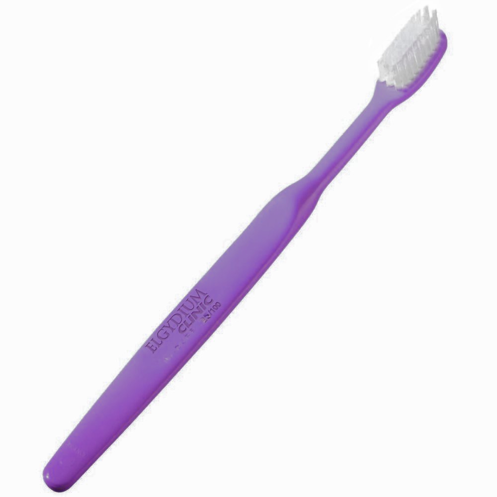 Elgydium Clinic 25/100 Semi-Hard Toothbrush Χειροκίνητη Οδοντόβουρτσα Μέτρια προς Σκληρή 1 Τεμάχιο – Μωβ