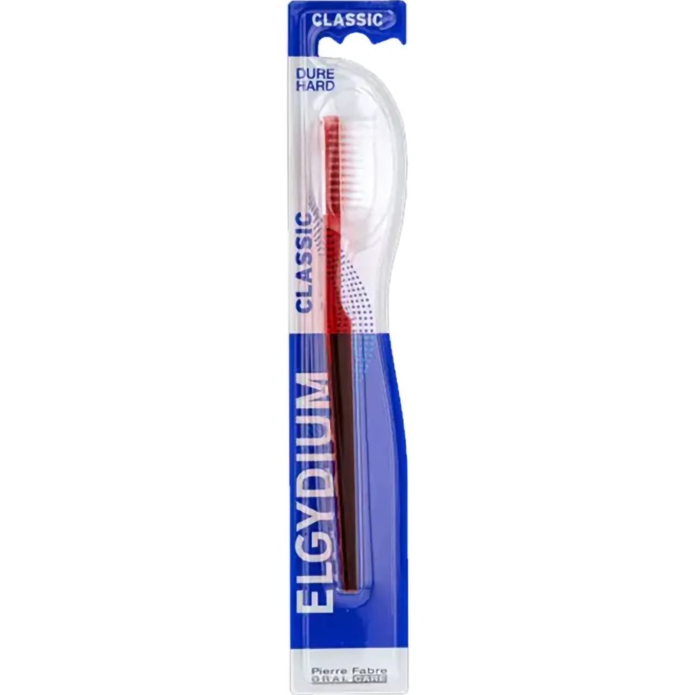 Elgydium Classic Hard Toothbrush Χειροκίνητη Σκληρή Οδοντόβουρτσα Ενηλίκων με Εργονομική Λαβή & Αποστρογγυλεμένες Ίνες 1 Τεμάχιο – Κόκκινο