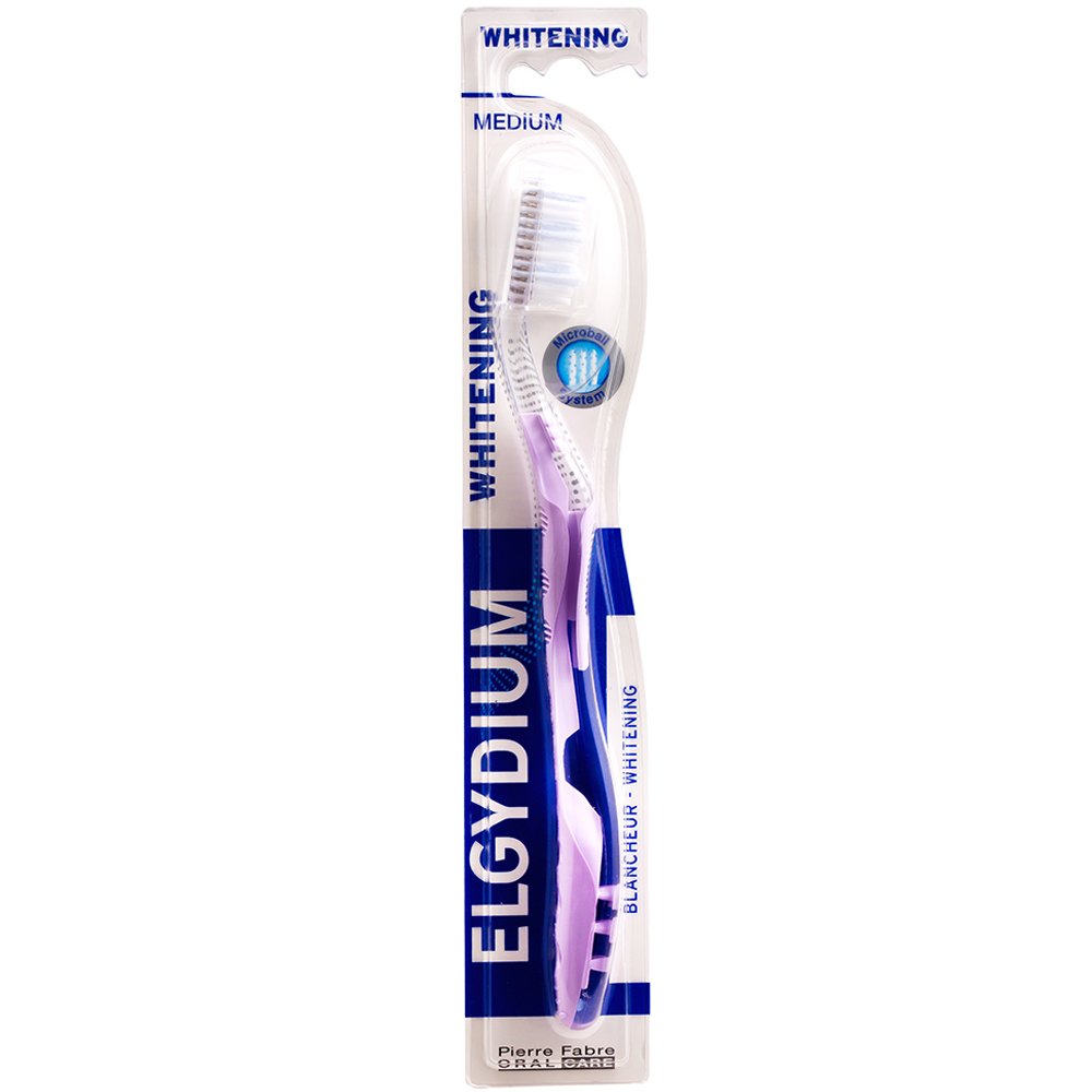 Elgydium Whitening Medium Toothbrush Μέτρια Οδοντόβουρτσα για πιο Λευκά Δόντια 1 Τεμάχιο – Μωβ